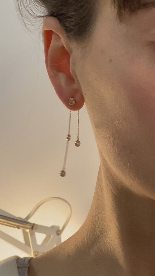 Pendientes largos de oro y brillantes