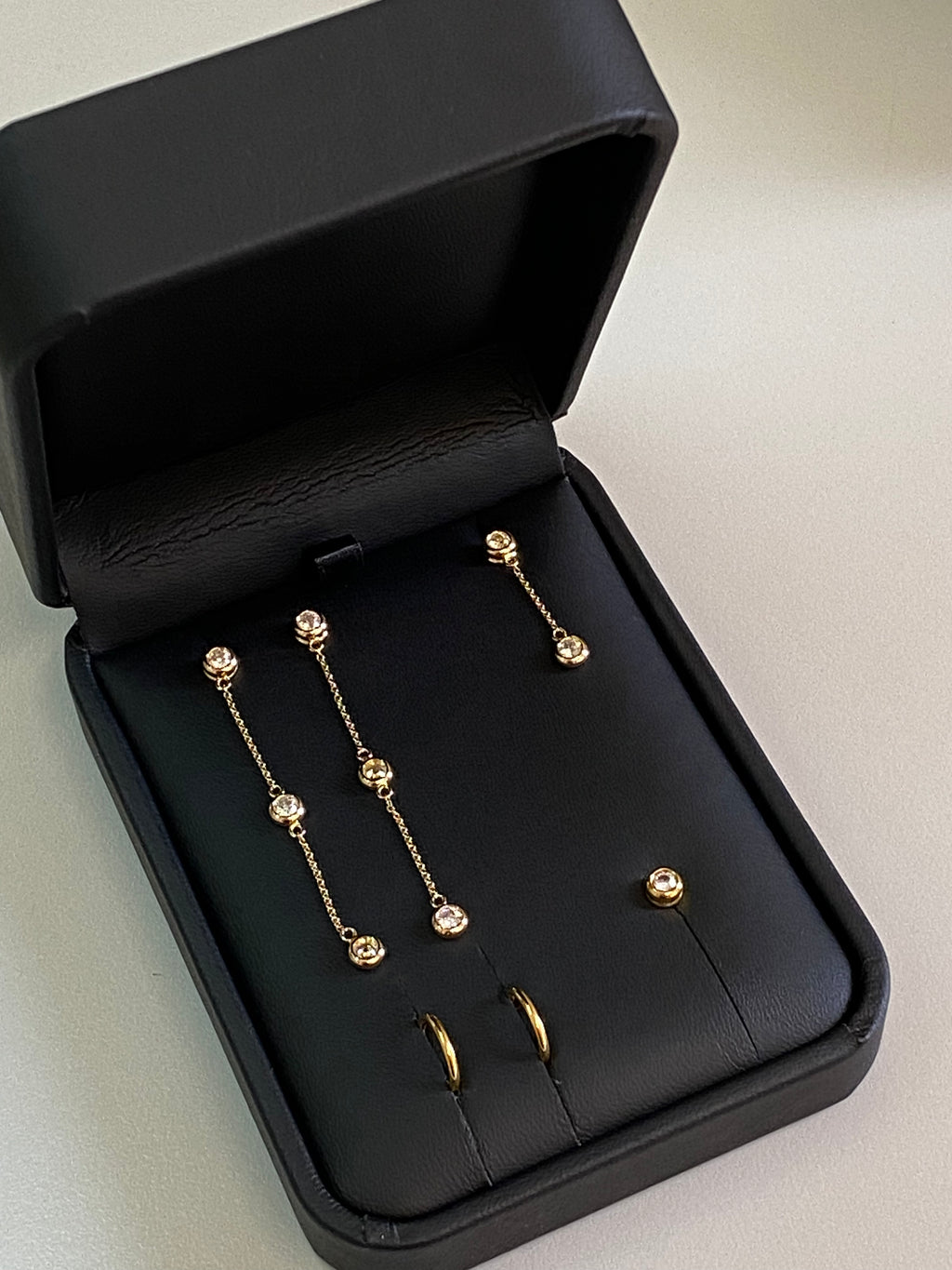 Long gold and diamond earrings
